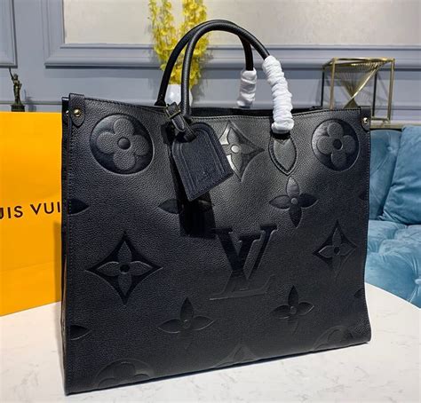 lv on the go black and white|OnTheGo MM Monogram .